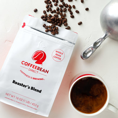 Coffee Bean Direct Roaster's Blend Subscription -- coffee bag with coffee beans spilling out and a mug of coffee